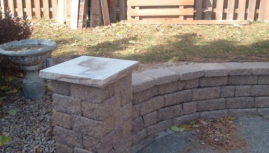 Weathered Chestnut Versa-Lok seating wall with Pillars in Burnsville