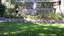 Boulder wall and landscape in Edina