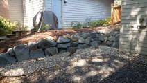 Blue trap boulder retaining wall in Apple Valley