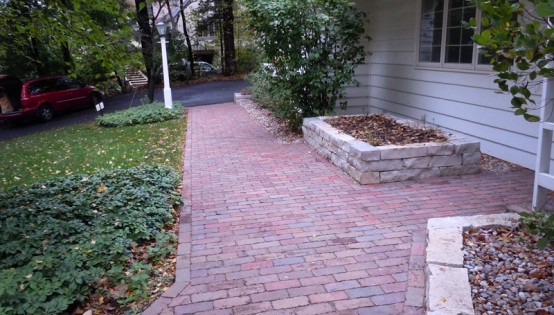 Reclaimed Purrington paver sidewalk and Fond Du Lac planter
